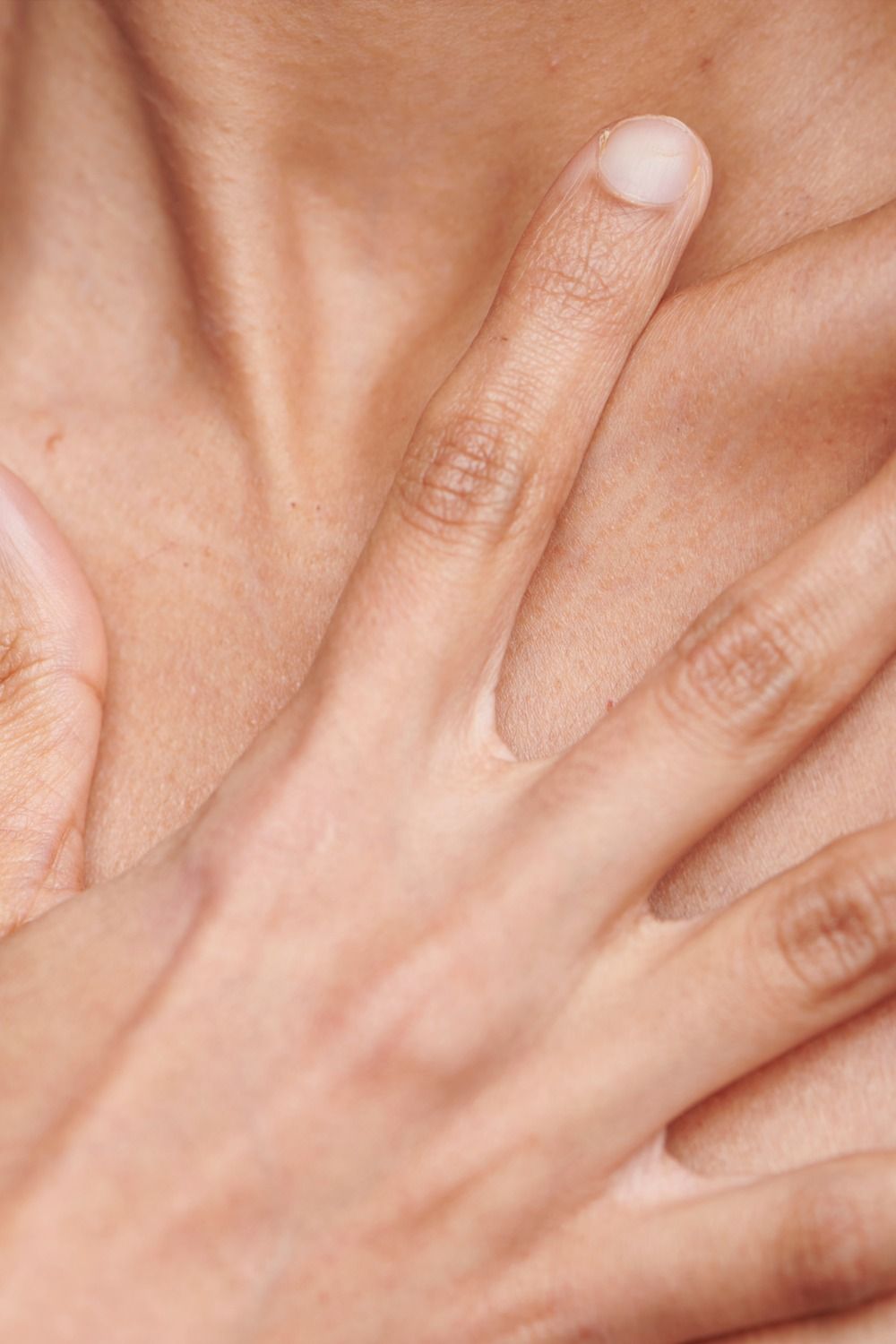 Close-up of hands on skin details.